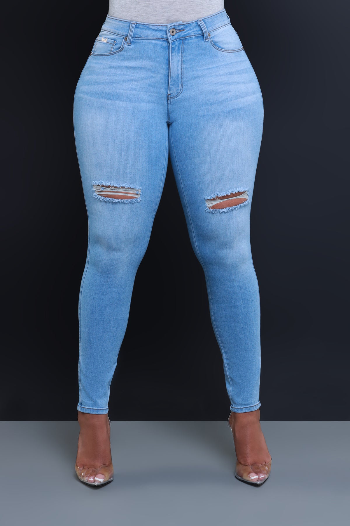 
              Steal The Show Hourglass High Rise Ripped Stretchy Jeans - Light Wash - Swank A Posh
            