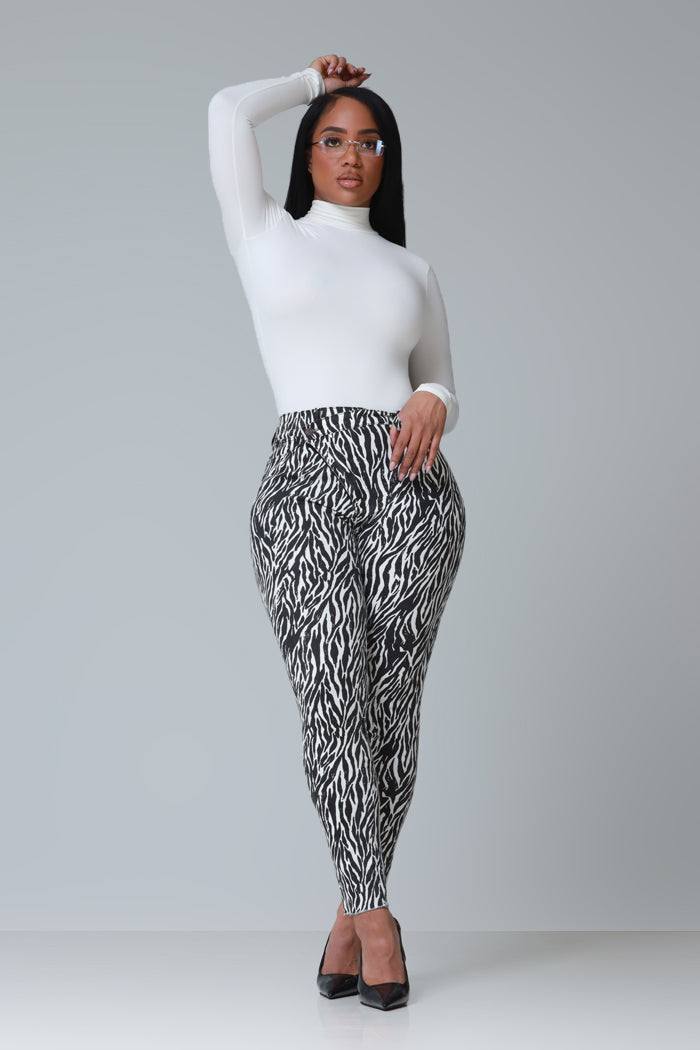 On Location Hourglass High Rise Animal Print Skinny Jeans - Black/White